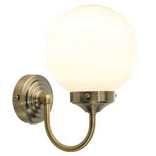 It includes a opal glass shade. Switched Bathroom Wall Light With Opal Glass Ball 3012 0102