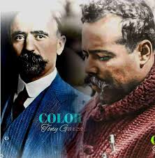 Familia de campesinos frente a la Catedral Metropolitana y Palacio  Nacional, la mujer con su criatura en la espalda, el hombre con sombrero de  "Piloncillo" y descalzos. Ca.1908. Historia y Color