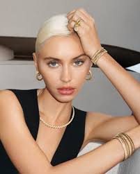 State of the art. Iris Law punctuates her look with a brilliant mix of  Sculpted Cable, crafted from 18K gold and sparkling diamonds.​ ​ Discover  More: https://bit.ly/40jlHAu