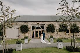 Healey Barn Countryside Wedding With Wildflowers And Bride In Pronovias Countryside Wedding Wild Flowers Barn Wedding Venue