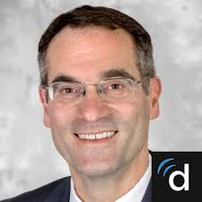 Dr. Adam J. Olszewski, MD