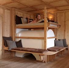 Traditional cabin structures are often made from classic timber or log materials, allowing these homes to blend in with the more rustic and natural environmental setting. Rustic Log Cabin Design With Stunning Interiors