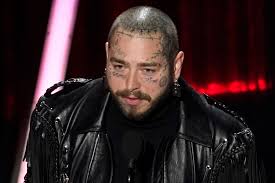 On december 9, 2016, he released his debut studio album stoney. Post Malone Wears A Skirt Knee High Socks At Billboard Music Awards Footwear News