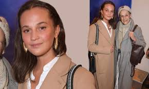 Alicia vikander source ›› алисия викандер. Alicia Vikander Is Elegant In A Tan Coat At Private Art Event With Her Mother Maria Fahl Vikander Daily Mail Online