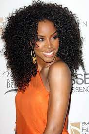 Separate it from the rest of the hair by clipping it and tying the rest of the hair into a pony after it has been gelled. Afro Hairstyles For Women Exuberant Spirals Incredible Volume Hairstyles Weekly Curly Hair Styles Hair Trends Hair Styles
