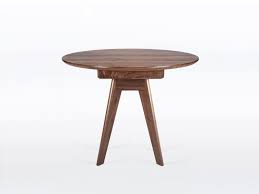 This expanding circular dining table is veneered in masur birch which is a really beautiful timber from scandinavia and northern. Handmade Round Expanding Dining Table In Solid Walnut Sister By Nathan Hunter Design Custommade Com