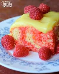 This Raspberry Lemon Cake Made With Jell O Gelatin And Jell O Pudding Is So Light And Refreshing Because It I Raspberry Lemon Cakes Desserts Poke Cake Recipes