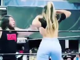 Ex-WWE wrestler and OnlyFans star flashes boobs to distract opponent and  send fans wild - Daily Star