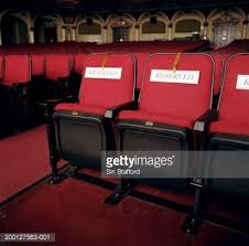 Red Theater Seats With Reserved Signs Reserved Signs Reserved Seating Seating Sign