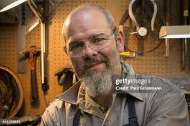 Portrait Of Jeweler In Workshop High-Res Stock Photo