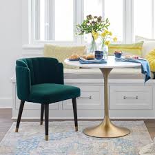 You'll find chairs upholstered in smooth velvet and crisp linen in a myriad of hues, and even medallion and floral prints. Emerald Green Velvet Channel Back Isadora Dining Chair World Market Dining Chairs Green Dining Chairs Velvet Dining Chairs