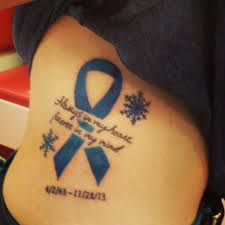 37 ribbon cancer tattoos ranked in order of popularity and relevancy. 15 My First Tattoo Ideas Cancer Tattoos Colon Cancer Tattoos Ribbon Tattoos
