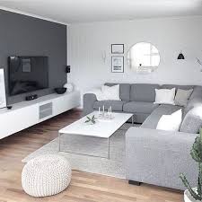 Take notes from these styling, examples, and shopping tips. Stylish Grey And White Minimalist Living Room Contemporary Interiors Living Roo Gray Living Room Design Elegant Living Room Design Living Room Design Modern