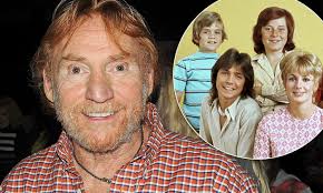 Actor & Disc Jockey Danny Bonaduce sitting in WEGX-FM Radio Station's  Studio.