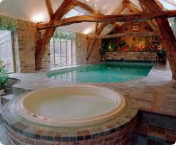 Having a pool inside the home is usually viewed as a symbol of opulence. Indoor Pool House Indoor Pool Design Indoor Swimming Pool Design