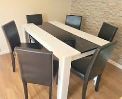 Shop wood dining room tables and other wood tables from top sellers around the world at 1stdibs. Modern White And Black Wood Dining Table With 4 Wood Faux Leather Chairs Ebay
