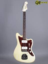 Part of the unique sound of jaguars and jazzmasters is the length of string behind the bridge. 1964 Fender Jazzmaster Olympic White Guitarpoint