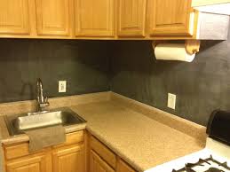 A chalkboard backsplash features a creative and unique look, when tiles are too common, marble a contemporary kitchen with pale wood and white furniture and a chalkboard backsplash and blakc. November 2013 Brooklyn Homemaker