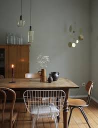 Swantje Hinrichsen Vintage Dining Table With Mismatched Chairs And Lappalainen Brass Mobile Vintage Dining Table Ikea Kitchen Mismatched Chairs