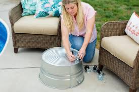 Using a reliable patio table to place your umbrella on can go a long way in ensuring its security. Diy Mobile Umbrella Stand Planter Hgtv