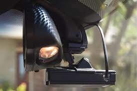 Close up and install of a radar detector mounting option called a blendmount. Blendmount Corvette Radar Detector Mirror Mounts
