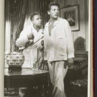 Danny Kaye in tavern with men