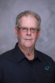 About Larry Falls — Associated Construction Products, Inc.