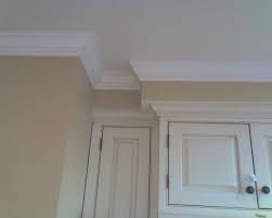 The Underside Of The Bulkhead Is Painted The Same Colour As The Cabinets And Meets The Ceili Kitchen Cabinet Crown Molding Kitchen Soffit Crown Molding Kitchen