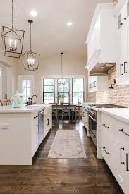 Gold Light Fixtures Colored Cabinet Wood Stained Island And White Backsplash Light Ha Industrial Farmhouse Kitchen Modern Farmhouse Kitchens Home Decor Kitchen