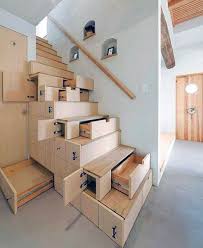 A dark wood floor and wood stair treads lead through and around the apartment, spiraling up onto the wood deck at the room. Top 50 Best Wood Stairs Ideas Wooden Staircase Designs
