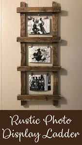 This Rustic Ladder Photo Holder Is Definitely A Fun And Unique Piece To Add To My Home Decor Such A Simple Way T Rustic Ladder Decor Rustic Decor Frames Decor