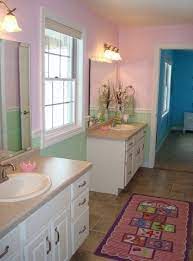 Jack and jill bathrooms allow occupants from two separate bedrooms to conveniently access the same bathroom. Pin By Cypress Homes Inc On Woodland Model By Cypress Homes Jack And Jill Bathroom Kids Bathroom Design Bathroom Kids