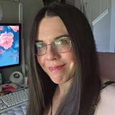 Cat's fascination with streamer and plastic