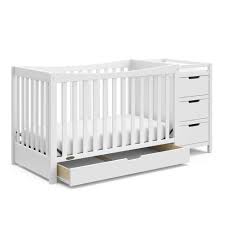 Many parents choose a baby crib with an attached changing table instead of getting both items separately for no better reason than to save space the changing table has an extra deep surface for security and stability. Graco Remi 4 In 1 Convertible Crib And Changer Target