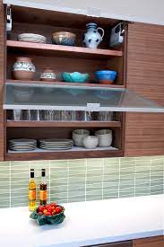 Wholesale kitchen cabinets & ready to assemble (rta) kitchen cabinets. Awning Style Pull Out Glass Cabinet Doors Midcentury Kitchen San Francisco By Talmadge Construction Inc Houzz