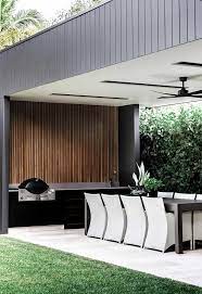 A Cottage In Gladesville Was Given A Modern Family Friendly Extension Outdoor Kitchen Design Modern Outdoor Kitchen Outdoor Kitchen Bars