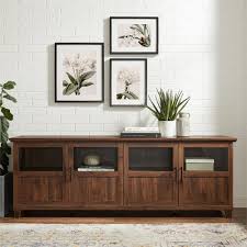 With an added bottom shelf to display on, the table is smooth to the touch and can support up. Walker Edison 70 In Tv Console Glass Wood Panel Doors Dark Walnut W70gd4ddw