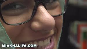 Wonderful Arab girl Mia Khalifa is excitingly undressing and posing in  library