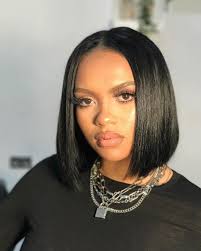 Ash blonde layered bob with black root. 30 Best Short Haircuts For Black Women With Round Faces