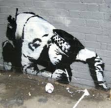 The name banksy is written as part of a mural on the side of a classroom at bridge farm primary in bristol on june 7, 2016. Keep Banksy S Identity To Yourselves Spoilsports All Things Vice