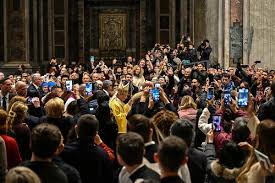 Pope Leo Surprises St. Peter's Crowd Before Christmas Eve Mass - The New  York Times