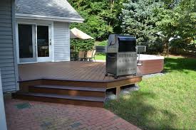 Hot tubs can be viewed as part of a homeowner's dream. Hot Tub Bullfrog Spas With Trex Deck And Cambridge Paver Patio Traditional Patio New York By Best Hot Tubs Hot Tub And Spa Experts Houzz Uk