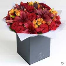 A Celebration Of The Warmest Most Vibrant Natural Colours This Magnificent Vera Wang Bouquet Is Christmas Flowers Christmas Flower Delivery Flowers Delivered