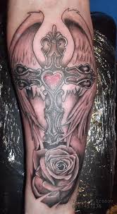 Well, if you liked this tattoo, then you might also want to look at our best rose tattoos. Rose And Cross Tattoo By Tattoobrasov On Deviantart
