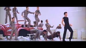 Greased lightning was an old, battered car purchased by kenickie that was remodeled into a street racing car. Grease Greased Lightning With Lyrics Youtube