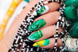 Stone Nail Design In White And Green Colors With Veins Of Dark Stock Photo Picture And Royalty Free Image Image 78338900 These are the nail colors you'll be seeing throughout fall, according to a nail artist—including one you may not have thought of as an autumn staple.