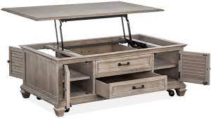 It sports a trendy geometric look that makes use of a variety of shapes to achieve cohesion. Magnussen Home Lancaster Lift Top Storage Cocktail Table With Casters T4352 50 Portland Or Key