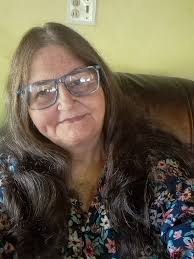 Introduction of a semi-retired teacher in the Dull Women's Club