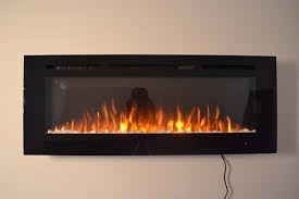 How do you mount an electric fireplace? 2021 New Premium Product 50inch Black Wall Mounted Electric Fire With 3 Colour Flames Pebbles Logs And Crystals