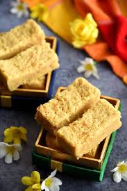 Learn How To Make Traditional Mysore Pak Recipe With Step By Step Pictures Porous Melt In Mouth Ghee Mysore Pak Recipe A Pe In 2020 Sweet Recipes Indian Sweets Food